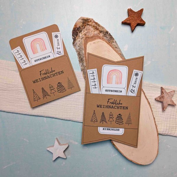 Gutschein Weihnachten verpacken. Druckvorlage für eine Gutscheinkarte bzw. Gutscheinhülle, auf der steht „Fröhliche Weihnachten“.