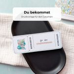 Gutschein Stadtführung Druckvorlage als PDF zum Downloaden. Auf dem Stadtführung-Gutschein ist ein aufgeklappter Stadtplan im Aquarellstil abgebildet.